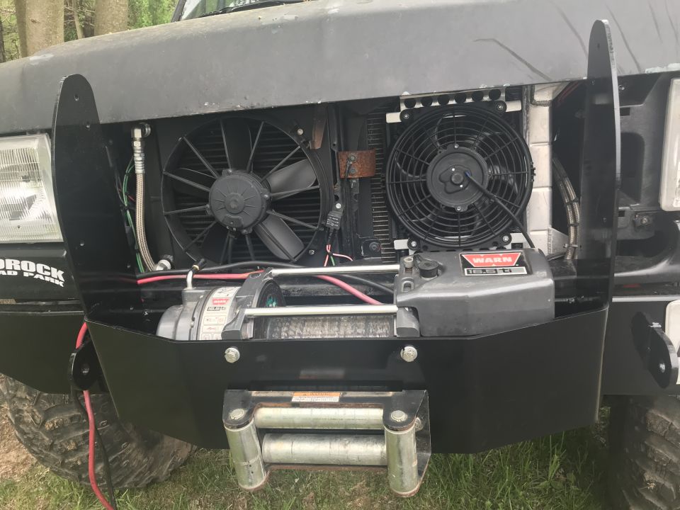 Black 1989 Ford Bronco front bumper with winch and dual fans