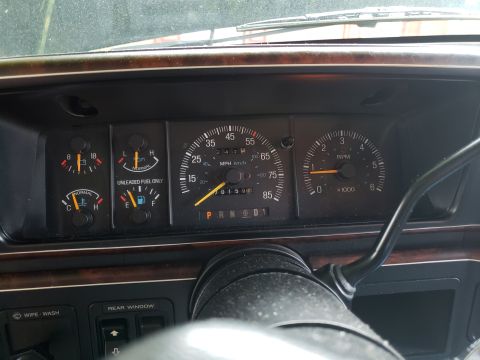 1989 Ford Bronco - Dashboard gauges of a 1989 Ford Bronco, showing speed, RPM, fuel level, and temperature.