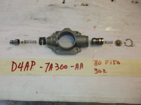 1979 Ford Ranchero - Disassembled engine part with handwritten labels indicating '80 F150 302'.