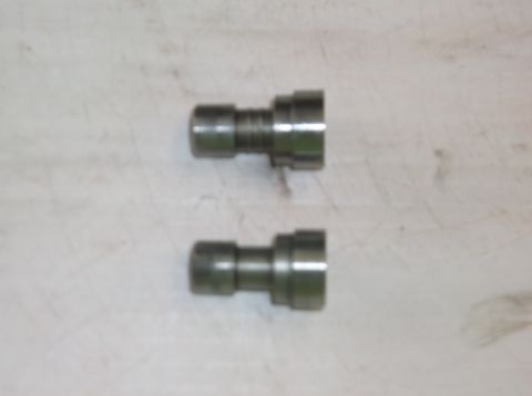 1979 Ford Ranchero - Two metal engine lifters are shown against a textured background. The image includes a 'SUPERMOTORS' watermark.