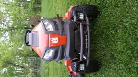 2007 Subaru Impreza - Husqvarna riding mower with added LED lights and brush guard.