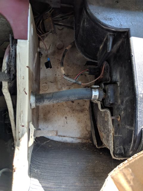 1971 Ford Ranchero - Close-up view of engine bay components including wiring and a hose.