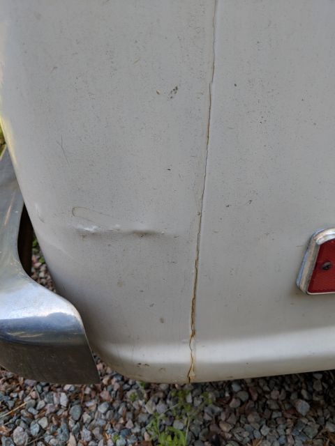 1971 Ford Ranchero - The rear of the vehicle shows some damage and rust along a panel seam.