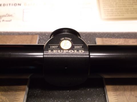 1995 Mercury Grand Marquis - A Leupold scope is shown in its packaging, with text indicating 100 years of operation.