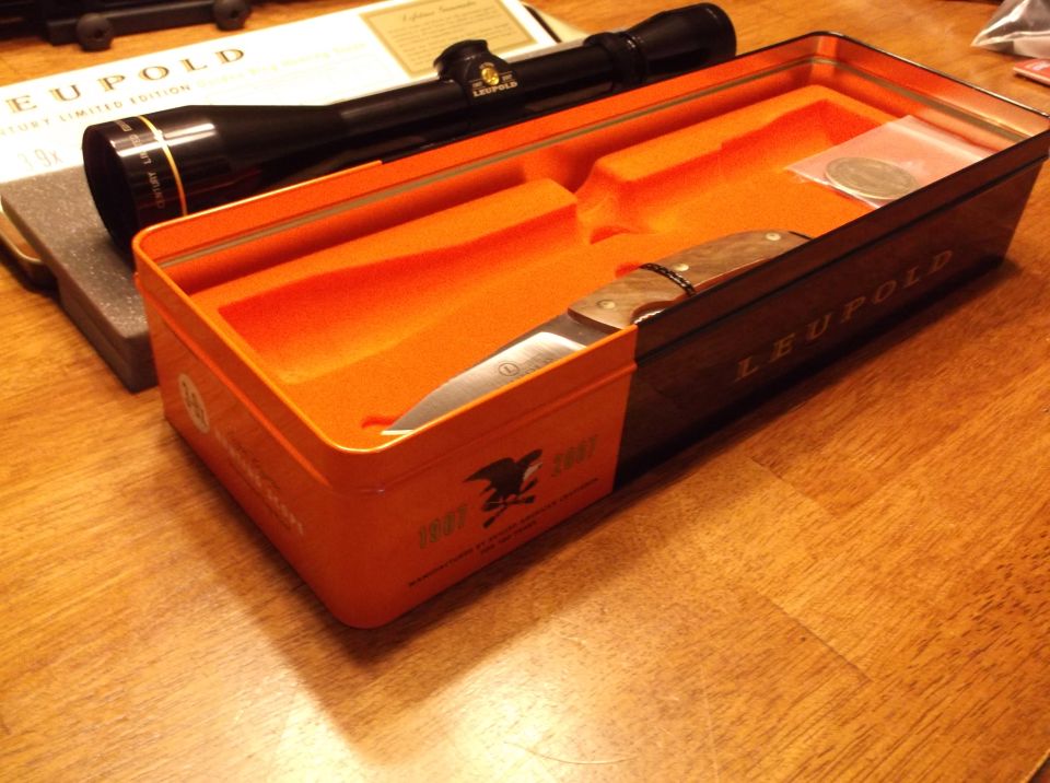 Leupold knife and scope set in orange and black case
