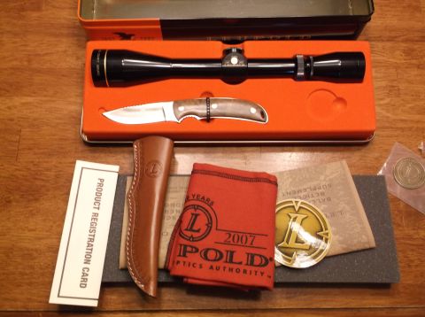 1995 Mercury Grand Marquis - Leupold scope and knife set with accessories, including a 2007 cloth.