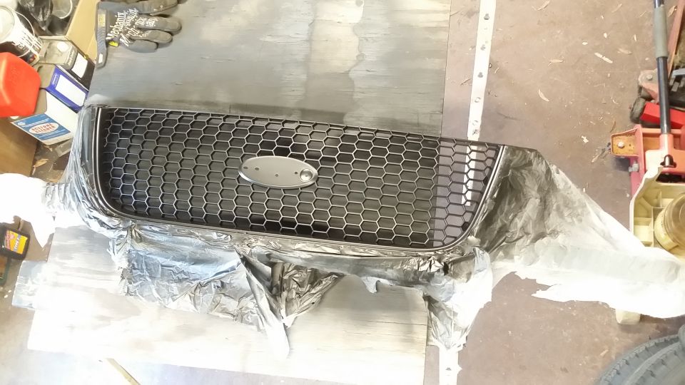 Hmmm.
Sidenote: The honeycomb grille CAN be separated from the whole unit but I chose to just mask instead of risking breaking anything.