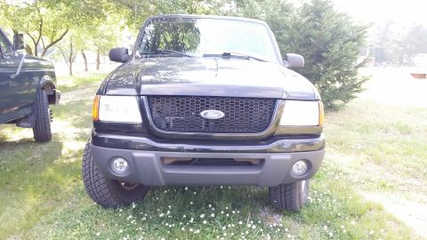 2003 Ford Ranger - Freaking awesome; SO much better than the blotchy, patchy faded gray factory color. 3 coats of primer and 4 coats of Duplicolor Low Gloss b…
