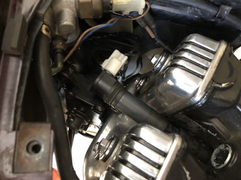 1983 Yamaha Venture - Detail shot of motorcycle engine parts, showing wiring and chrome accents.