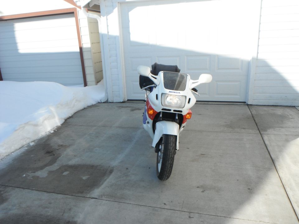 1989 Honda CBR600F motorcycle, front view, parked in driveway