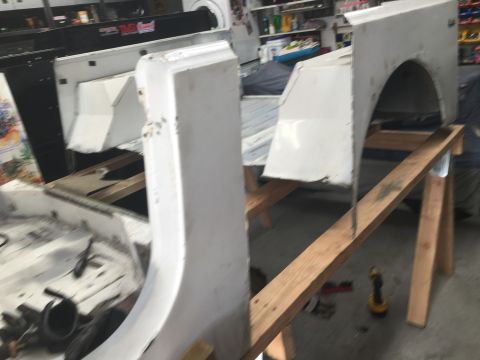 1992 Jeep Wrangler - Body panels for a Jeep Wrangler are disassembled and staged for work.