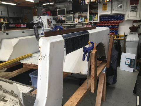 1992 Jeep Wrangler - Jeep body panel undergoing repair work in a garage setting.
