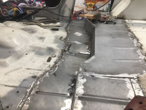 1992 Jeep Wrangler - Vehicle interior floor pan undergoing repair with new metal welded into place.