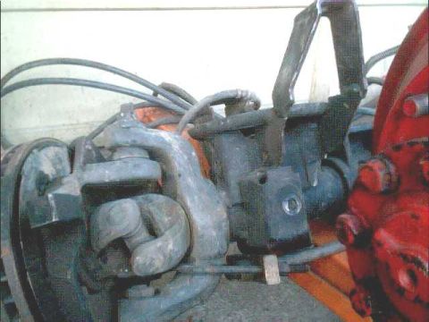 1978 Ford Bronco - Close-up view of a U-joint and engine components, likely from a Ford Bronco.