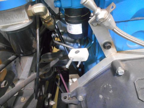 1992 Ford Bronco - Engine bay components including a fuel filter and plumbing are visible in this close-up shot.