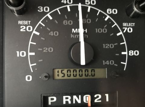 1995 Ford Bronco - The speedometer reads 50 MPH, while the odometer shows 150,000 miles.