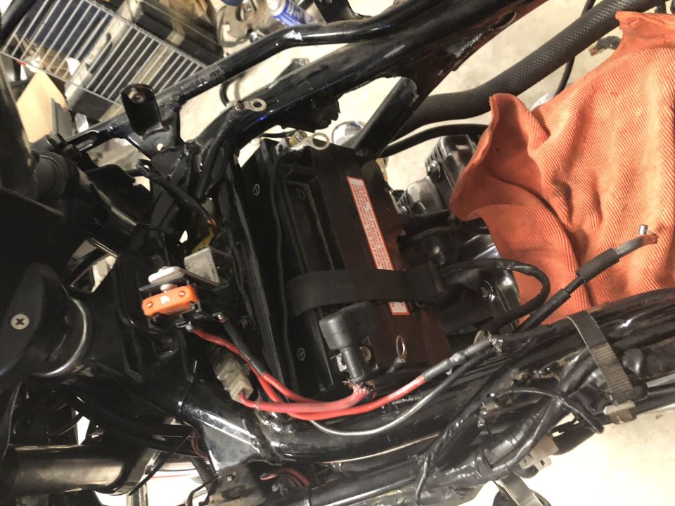 Motorcycle battery and wiring with orange fuse holder
