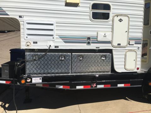1992 Jeep Wrangler - This is a truck camper with toolboxes mounted on a trailer frame, not a 1992 Jeep Wrangler.