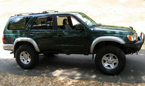 2002 Toyota 4Runner - This 2002 Toyota 4Runner is shown from the side, an aftermarket bumper and lifted suspension.