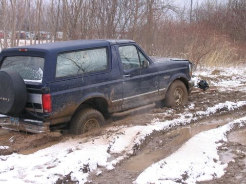 1994 Ford Bronco - Pass front tire on the 4x4 we burried in the ground