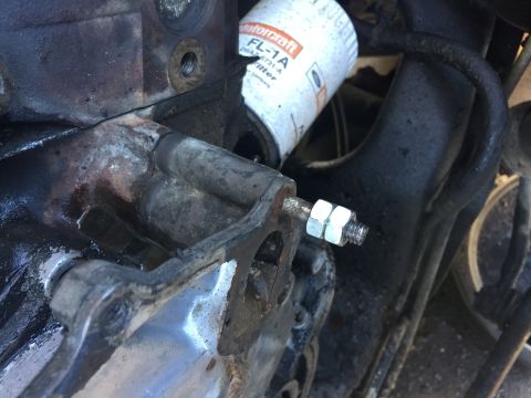 1996 Ford Bronco - A close-up view of an engine component with a Motorcraft oil filter visible.