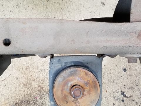 1996 Ford Bronco - The impact was so hard that this mount (#3 LHS) bent forward, evidenced by the spalled paint near the frame at the front & rear corners. Co…