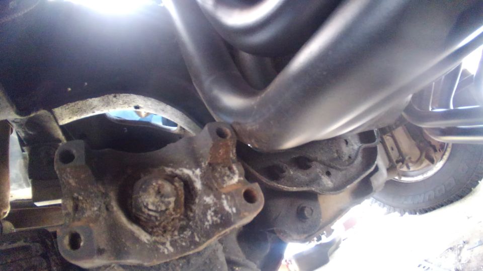 my original headers were Hedman long tube headers that defiantly interferenced with the frotn driveshaft. so this time i took a gamble and ordered Hooker long tube headers.

doing a quick mock up i saw there was practically no clearance between the frotn axle yoke and the header. my plan is i can rotate the engine inside the motor perches if i really need any extra clearence. also i will use JBG motor and tranny mounts what will raise the engine and trans about an inch. but i wont know for certian my option till the tranny, t-case, and front driveshaft are in

these may also get returned