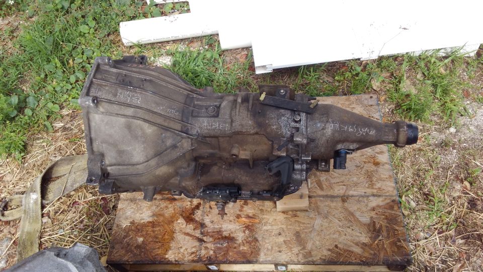 old 2wd transmission is pulled to swap in a 4x4 version i bought cheap.
