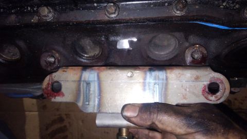 1990 Ford F-250 - ground down the block. you can see the spot on the motor mount it was hitting