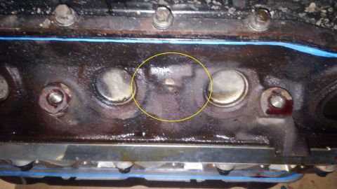 1990 Ford F-250 - driver side motor mount hit this section. a quick but with angle grinder fixed that