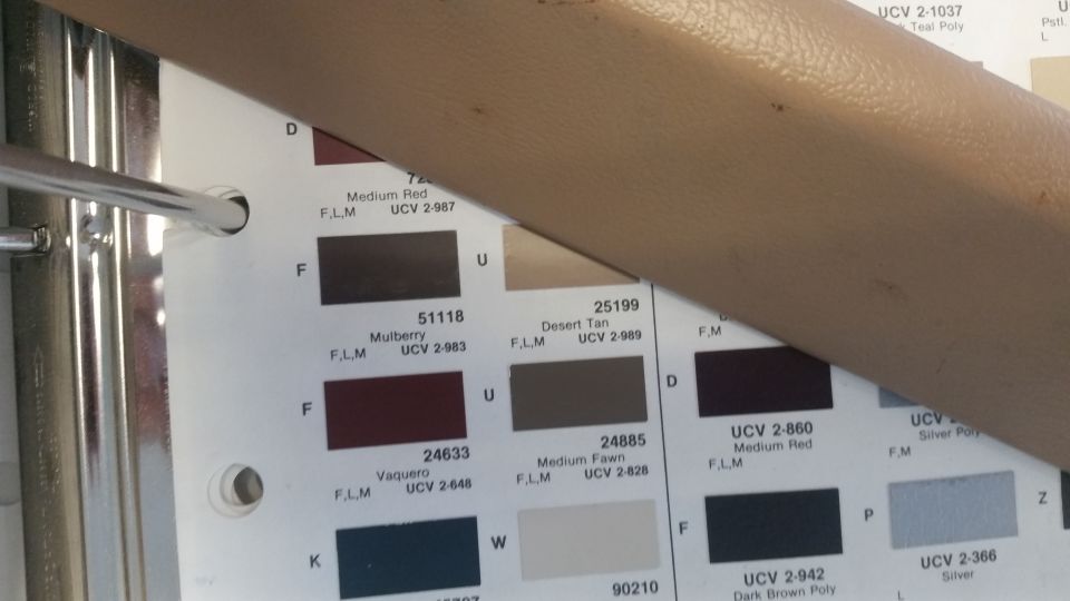 Automotive paint color chip chart listing paint codes and names like Medium Red, Desert Tan, Mulberry