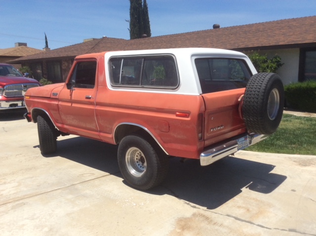 1978 Ford Bronco, orange and white, rear-side view, spare tire on back