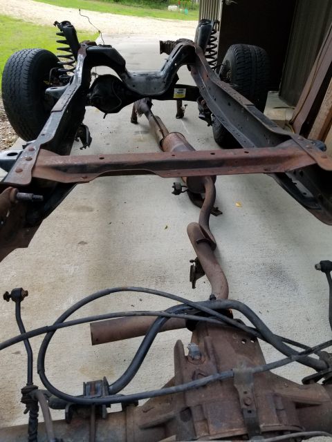1996 Ford Bronco - With the front suspension unloaded, I was able to flip the exhaust to work it over the axle, and slide it out the front of the frame. The b…