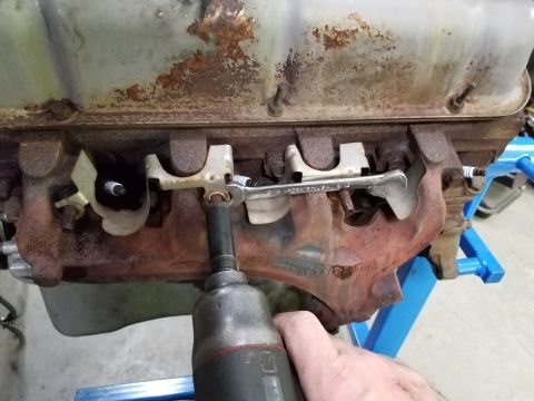 1996 Ford Bronco - I had to use my thinnest open wrench to back up the exhaust shield nuts. 2 of the bolts were broken. [url=https://www.supermotors.net/regis…