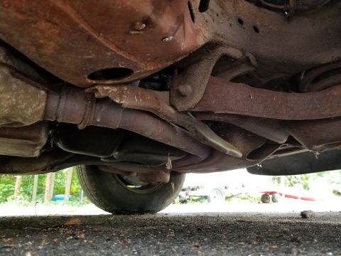 2001 Ford Crown Victoria - Photograph of the vehicle undercarriage and suspension, not a technical document.