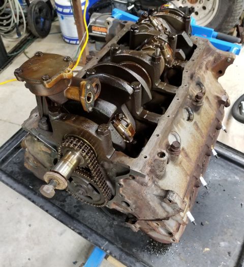 1996 Ford Bronco - The oil pump pickup was clear, but it's also clean now. The oil pan gasket appears to be reusable. But there are still 2 broken bolts in ea…