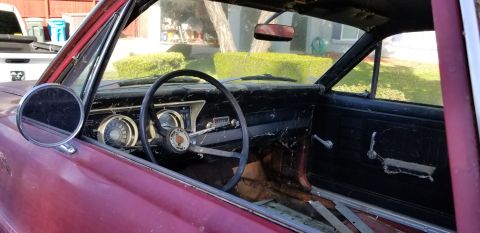 1966 Ford Ranchero - Interior view of a 1966 Ford Ranchero, showing the dashboard and steering wheel.