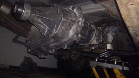 1990 Ford F-250 - tranny and t-case are in. just need to drill holes in frame for the cossmeember