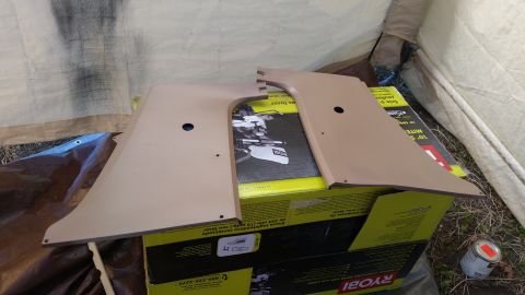 1985 Ford Bronco - Interior door panels are laid out, possibly for restoration or installation.