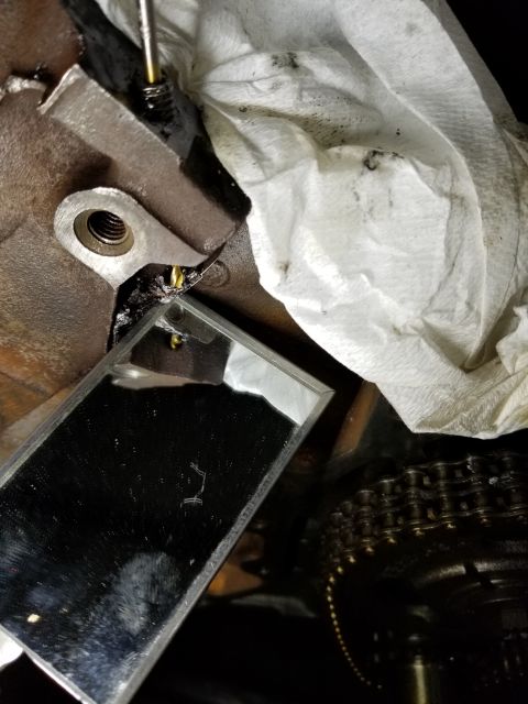 1996 Ford Bronco - I drilled through, to check that the hole was centered & aligned, and stepped up 1/32" at a time to 1/4", which I drilled left-ha…