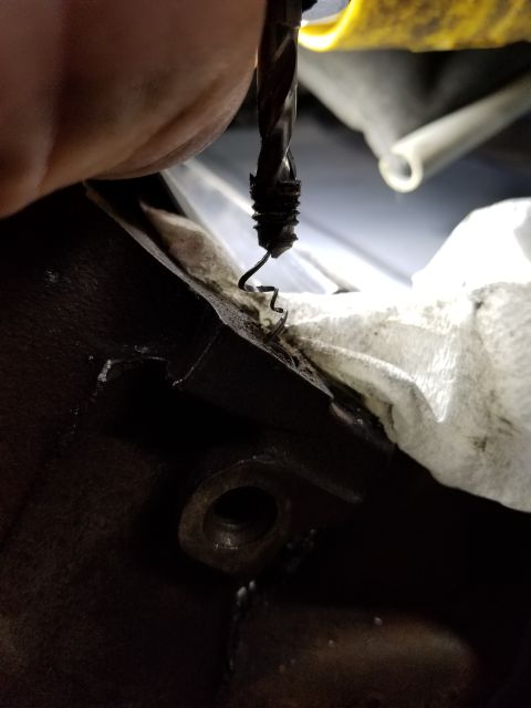 1996 Ford Bronco - Unfortunately, the bolt still didn't unscrew, but it was so thin that most of the bolt thread peeled out of the head's threads. See the PRE…