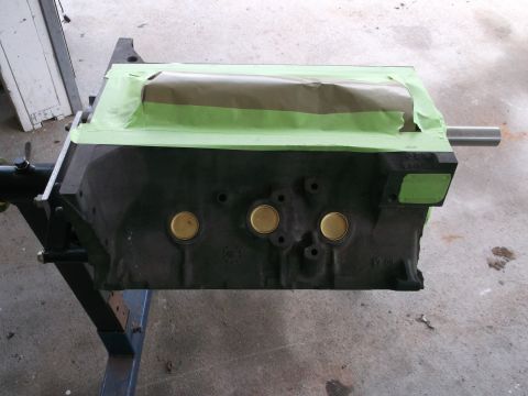1969 Ford Mustang - Engine block prepared with masking tape for painting or other work.