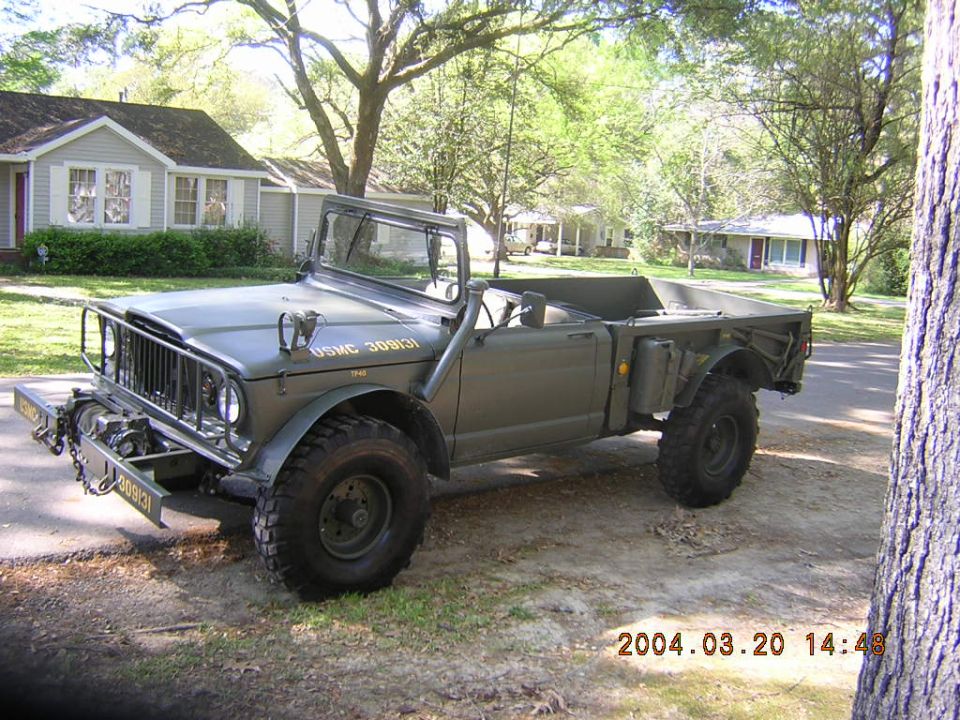 Olive drab military truck with winch and USMC 309131 markings