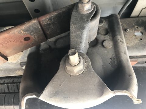 1997 Dodge 3500 - Vehicle's rear suspension leaf spring and bracket assembly shown in detail.