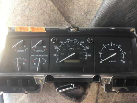 1996 Ford Bronco - Instrument cluster from a vehicle, showing various gauges and indicators.