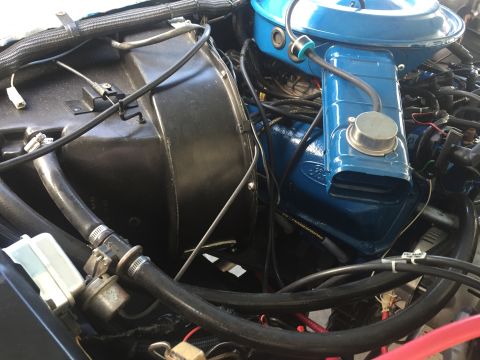 1978 Ford Bronco - Engine bay of a 1978 Ford Bronco, blue valve covers and air cleaner assembly.