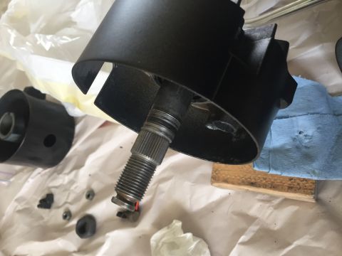 1978 Ford Bronco - Disassembled steering column components laid out on a surface.