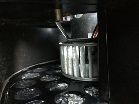 1978 Ford Bronco - Close-up of a vehicle's blower motor and housing, likely part of the AC or heating system.