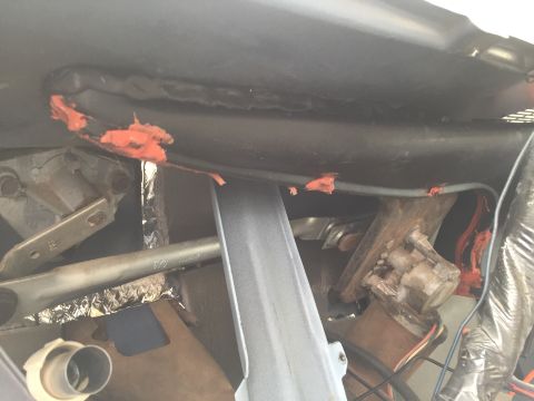 1978 Ford Bronco - HVAC components and wiring are visible under the dashboard, with orange sealant applied.