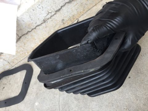 1978 Ford Bronco - Black rubber seal and plastic housing with ribbed bellows, likely an AC or heating part.